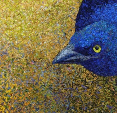 Photo of a weaving depicting a bluebird`s head on a yellow background.
